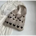 Large capacity beige knitted hollow tote bag featuring black heart patterns for women - Khaki