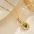 Macro view of retro gold-plated necklace with green heart zircon and bow detail - Bowknot Heart Style (80493) / Pendant Only (With Stainless Steel Chain) / Gold Tone (Emerald Green Zirconia)