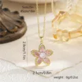 Dainty gold-tone flower pendant necklace with pink crystals and adjustable chain length. - Style 80423 (With Stainless Steel Chain)