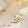 Elegant gold-finished rotatable flower pendant necklace set with sparkling white crystals - Style 80454 (With Stainless Steel Chain)