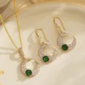 Elegant gold crescent moon jewelry set with emerald green and white zircons - Moon Shape 2-Piece Set (80494) / 3-Piece Set (Earrings + Pendant + Chain) / Gold Tone (Emerald Green Zirconia)