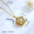 Rotatable gold flower fidget pendant necklace featuring a white pearl and crystals - Artificial Pearl Hollow Flower Style (80443) / Adjustable Length