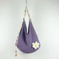 Purple knit hobo shoulder bag with colorful strap and white flower patch for casual daily wear. - Large Flower Pattern / Purple