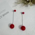 Elegant red bead tassel earrings with silver chain on textured white background - 7cm / Silver Cherry Red