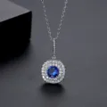 Elegante collar de plata con colgante redondo de CZ azul y pavé de cristales blancos. - Redondo (N13110402-Bu) / Azul