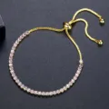 Elegante pulsera dorada ajustable con una hilera de circonitas rosas brillantes. - Estilo de Cadena de Tenis Ajustable / Dorado Rosa (B22041501-Pk18K)