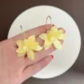 Gentle and sweet yellow resin flower earrings for summer beach vacation style - Yellow Hoop Style (E4018)