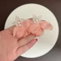 Elegant pink fabric flower stud earrings with delicate pearl centers for summer. - Fabric Flower Stud Earring (E5432) / Pink