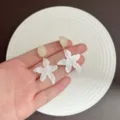 Elegant pearlescent white flower stud earrings for sweet summer beach vacation style - Pearlescent Flower Stud Earring (E5396) / Gold/White