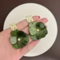 Elegant green resin flower earrings with gold textured square studs for summer resort style. - Gold Green Style (E3922)