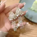 Elegant white floral earrings with pearl tassels for a sweet summer vacation look. - Long Floral Tassel Stud Earrings (E3172 Gold)