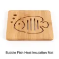 Sottopentola in bambù naturale con design creativo a forma di pesce palla intagliato - 16cm / Tappetino Quadrato Pesce Bolla