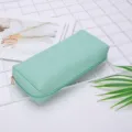 Mintgrüne PU-Leder-Kosmetiktasche mit wasserdichter Kreuznarbe und Reißverschluss. - Hellgrün