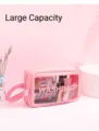 Large capacity pink waterproof travel cosmetic bag with transparent front and hand strap - Peach