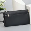 Elegant black PU leather crossbody phone bag with double zipper and gold hardware - 20x3.5x12cm / Black