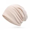 Soft beige knitted slouchy beanie hat in granular cotton fabric for autumn and winter - 57-60cm (Elastic) / Beige