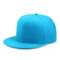 Gorra de béisbol hip-hop de color azul brillante con visera plana para niños con estilo - 50-54cm / Azul lago