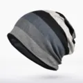 Slouchy knit beanie hat with grey and black horizontal stripes for winter warmth and style - Thin / Striped Grey