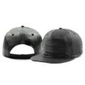 Stylish black PU leather hip-hop snapback cap featuring three decorative zippers - Rear Single Row Plastic Buckle / Black
