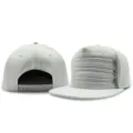 White PU leather hip hop snapback cap featuring three stylish front zipper accents - Rear Single Row Plastic Buckle / White