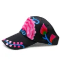 Ethnic style sun visor featuring vibrant floral embroidery on a black fabric base - Cockscomb / Adjustable / Black