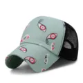 Ademende mesh trucker pet met uniek oogpatroon in een lichtgroene en zwarte afwerking - Verstelbaar (55-59cm) / Vispatroon-Blauwgroen