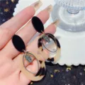 Retro leopard print oval resin hoop earrings with gold metal accents and charm. - Nested Oval Leopard Pendant Style (E3136) / Gold (E3136)