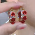 Detailed close-up view of vintage style red rose hoop earrings with shiny white crystals - Rose Rhinestone Hoop Earrings (E3233)