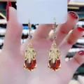 Elegant retro Ankara red PiXiu drop earrings with gold finish and rhinestones - Pixiu Ruby Red Hoop Earrings (E2582)