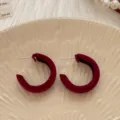 Elegant Ancola red velvet C-shaped earrings for women on a textured ceramic plate - E3780 Gold Red (C-shape Flocked Style)