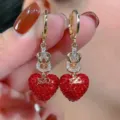 Sparkling Ankara red heart earrings with full rhinestone pavé and gold knot link. - 520 Heart Rhinestone Style (E3803) / Red