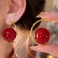 Detailed view of elegant Ankara red C-shaped hoop earrings featuring large pearls - C-shaped Artificial Pearl Decor Style (E3192) / Ancorra Red