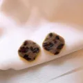 Detailed view of vintage leopard print flocked square stud earrings with gold trim. - Geometric Cube Flocked Studs (E5037) / Gold (E5037)