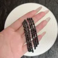 Vue détaillée de boucles d'oreilles pendantes à pampilles en strass noirs étincelants. - Boucles d'Oreilles Longues à Gland Strass Complet Robustes Européennes et Américaines (E5020) / Noir Fusil