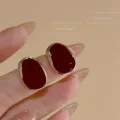 French vintage Ancora red oval enamel stud earrings with an elegant gold-tone border - Irregular Oval Stud Earrings (E3495)