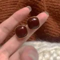 Elegant French retro dark red square stud earrings with polished golden rim finish - Minimalist Square Stud Earrings (E3604)