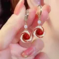 French vintage style red bead earrings featuring a crystal-encrusted swirling frame design - Red Enamel Spiral Frame Red Bead Style (E4588)