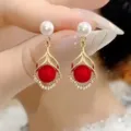 French vintage gold drop earrings with Ankara red and white pearls and crystal details - Hollow Pendant Inlaid Red Bead Style (E4655)