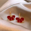 Elegant Ankara red enamel flower drop earrings featuring a textured gold-tone center - Five-Petal Flower Style (E3965 Gold Red)