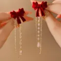 Elegant French style red velvet bow earrings featuring dangling pearls and crystal tassels - Red Velvet Bow Artificial Pearl Tassel Style (E2689)