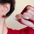 Elegant red bead bow earrings with gold finish for festive winter and autumn wear - Bow Knot Round Bead Style (E4250) / Ancorra Red