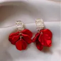 Elegant French style red petal drop earrings with sparkling crystal accents for women. - Rhinestone Tiered Petal Earrings (E3298)
