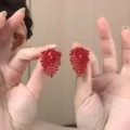 Elegant red sparkling rhinestone tassel drop earrings with a stylish petal shape design - Rhinestone Petal Tassel Style (E4374) / Red