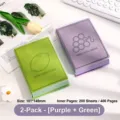 Set mit 2 dicken Notizbüchern mit Fruchtmotiven in Violett und Grün, 400 Seiten pro Buch - Zitronengrün + Traubenlila