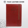 Detailed macro view of the embossed tree design on a red faux leather journal cover - A5 / Brown