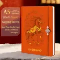 2026 Year of the Horse A5 planner in orange with embossed horse and Chinese knot charm - 中国结横线本 / A5规格200页 / Brown and Orange