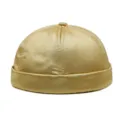 Stijlvolle vintage satijnen dockermuts in champagnegoud voor unisex streetwear - M (56-58cm) / Satin Stijl / Goud