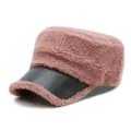 Stylish pink sherpa fleece military cap with a black leather brim for winter warmth. - Adjustable Fits 56-59cm / Dusky Pink