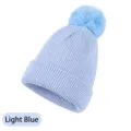 Gorro de punto de acrílico azul claro con pompón decorativo de piel sintética - Talla Adulto (54-60cm) / Azul Claro