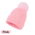 Gorro de punto de acrílico rosa con un pompón grande a juego para un calor elegante. - Talla Adulto (54-60cm) / Rosa